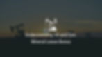 photograph of 4 oil rigs on land in front of a sunrise