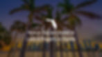photograph of Miami's skyscape with the ocean and palm trees in the foreground