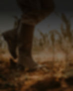 Landowner walking outside on land